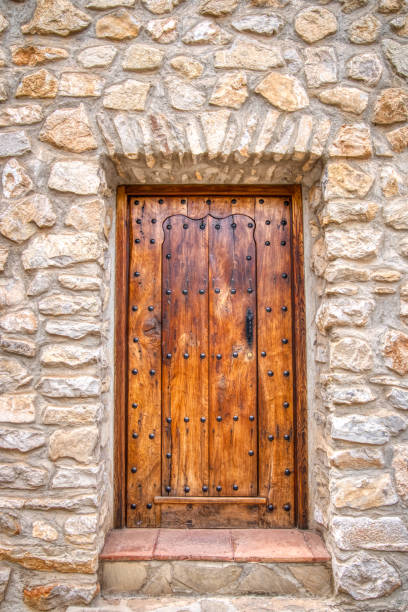 istock Old Medieval Wood Doorway in Spain 2190451759