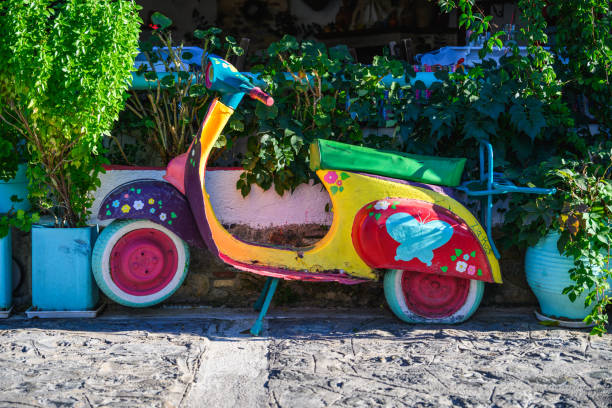 Colourful children's bicycle in courtyard, Kos