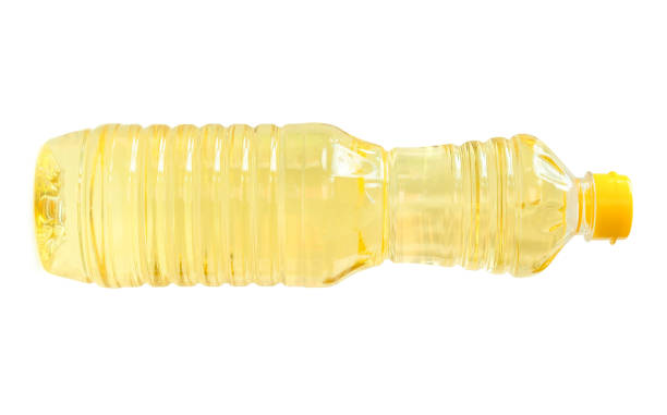 istock Light yellow cooking or vegetable oil in small plastic bottle isolated on white background with clipping path 2190455175