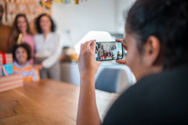 istock Diverse Family Gathering Captured on Smartphone Camera 2190459900