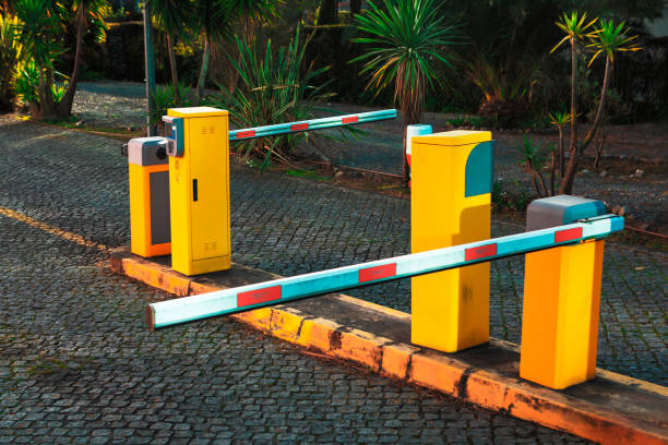 istock Parking lot entrance or exit with automated barrier gates 2190462110