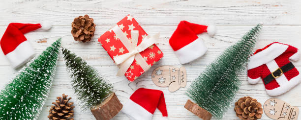istock Flat lay composition with christmas trees on color background. Top view with copy space 2190467724