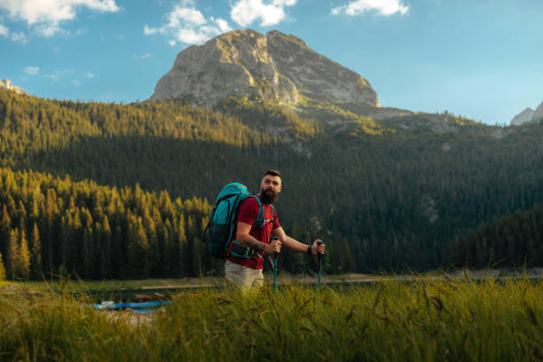 istock Hiker in a scenic mountain landscape 2190468184