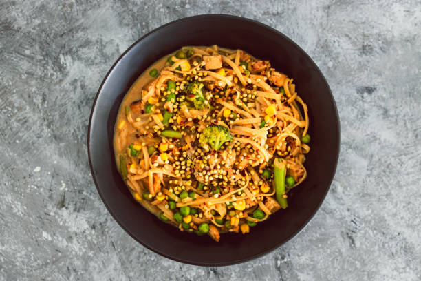 istock plant-based rice noodles with mixed greens and coriander seeds 2190469972