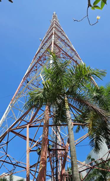 istock Bottom view of antenna system for broadcast, telecommunication, television system with blue sky in background. 2190470829