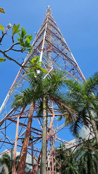 istock Bottom view of antenna system for broadcast, telecommunication, television system with blue sky in background. 2190470832