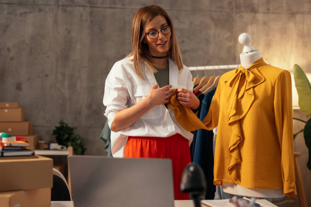 istock Designer considering details on clothing 2190474482