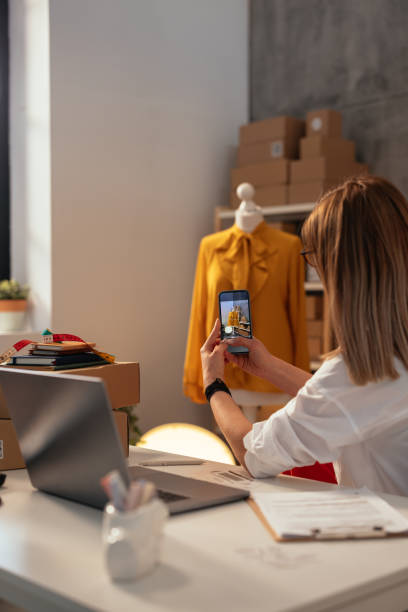istock Photographing a boutique display for promotion 2190474492