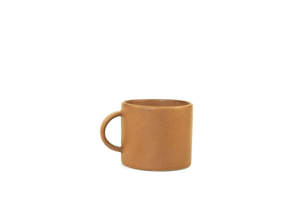 istock Empty brown mug isolated on white background. Use for home or restaurant, food design. Concept kitchen utensils and tableware. Side view. 2190479771