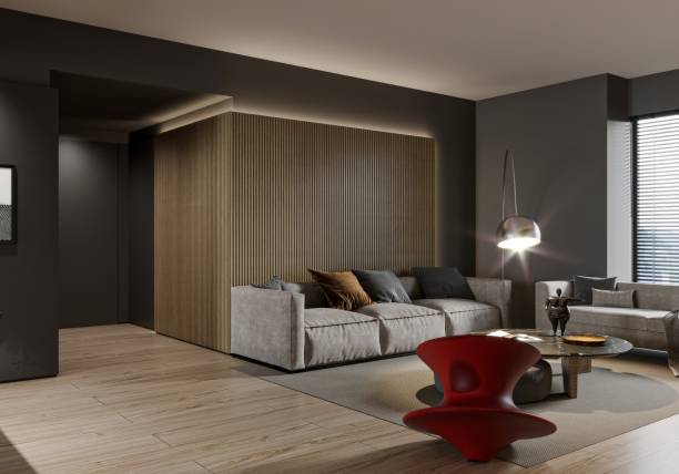 istock Modern Living Room Interior with Textured Accent Wall and Bold Red Chair 2190483033