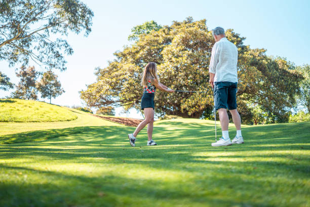 istock Joyful Caucasian Couple Golfing Together 2190489113