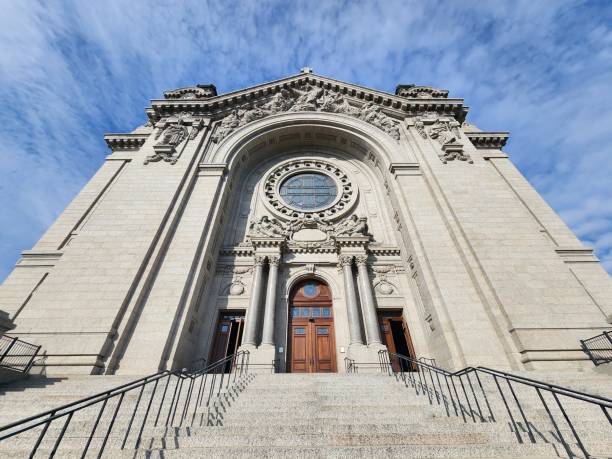 istock Majestic cathedral facade under a blue sky. 2190492128