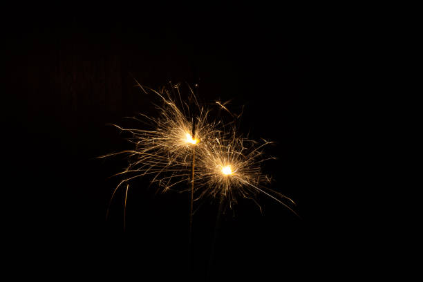 istock Burning bengal sparks isolated on black background 2190494530