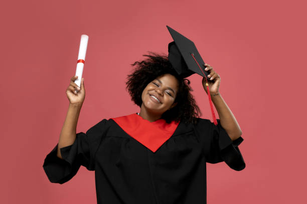 istock A young African American woman in a graduation uniform 2190496409