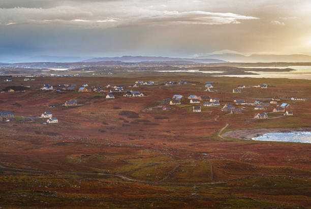 istock irish rural village by the coast at sunset 2190496787