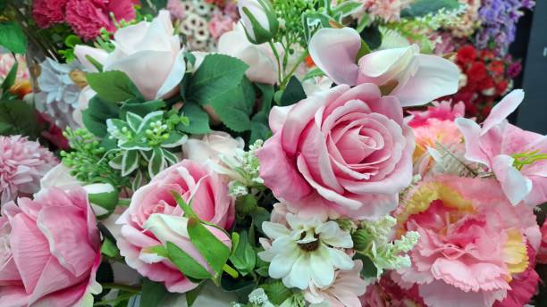 istock Background wall with artificial flowers of various colors 2190497886