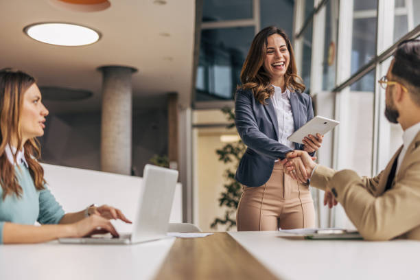 istock business woman giving a presentation 2190497931
