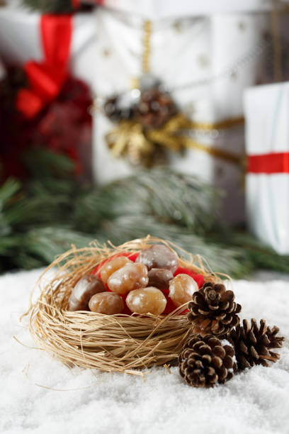 Candied chestnuts in a Christmas Concept.