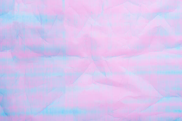 An abstract background featuring pastel hues of pink and blue