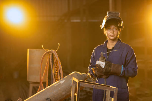 istock Woman welder in metalworking workshop 2190504435