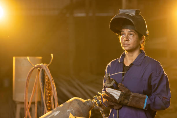 istock Woman welder in metalworking workshop 2190504440