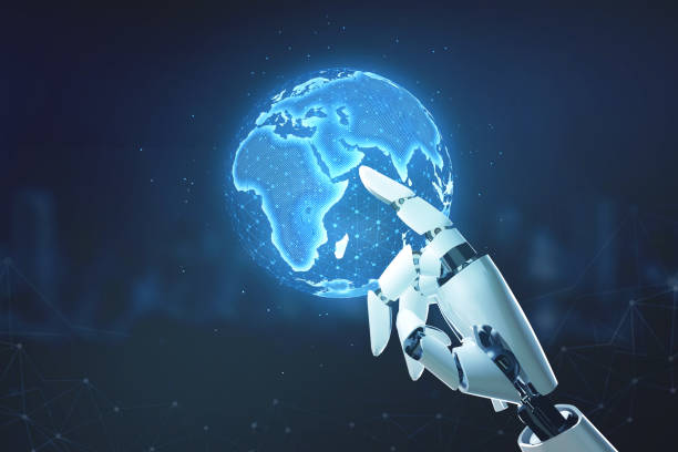 istock Robotic Hand Interacting with Global Network: A robotic hand, composed of sleek, white metal, reaches out to touch a glowing blue hologram of the Earth. 2190507242