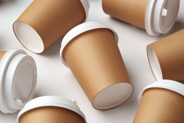 istock A collection of disposable coffee cups arranged artfully on a white surface 2190509894