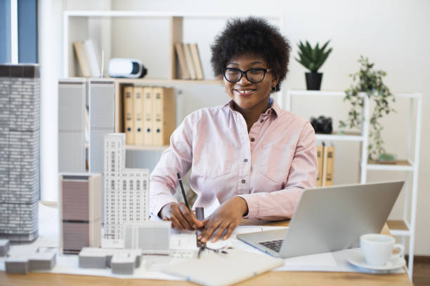 istock African woman architect working on city design project 2190510193