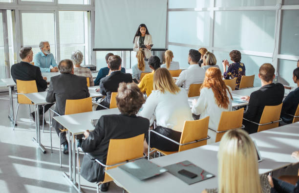 istock Diverse Professionals Engaging at Business Conference 2190510272