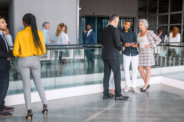 istock Diverse Professionals Engaging in Business Discussions 2190510315