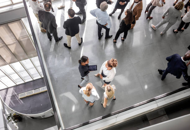 istock Enthusiastic Diverse Professionals Networking at Business Event 2190510415