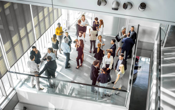 istock Diverse Professionals Engaging Enthusiastically at Business Conference 2190510422