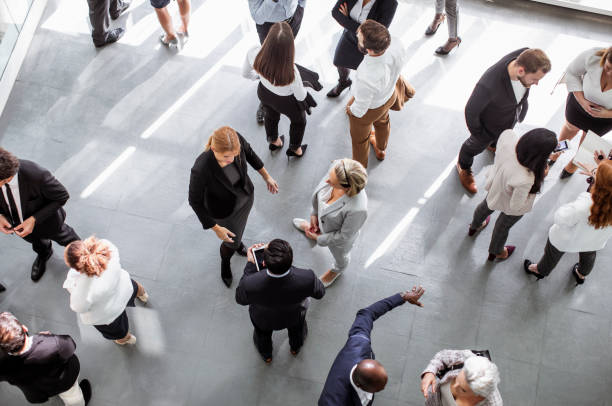 istock Diverse Professionals Engaging Energetically at Business Conference 2190510429