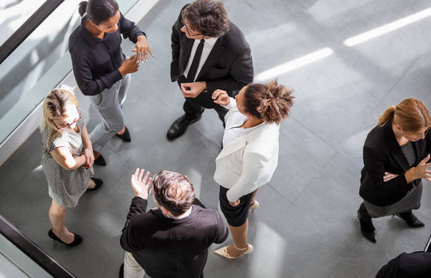 istock Diverse Professionals Engaging Energetically at Business Conference 2190510436