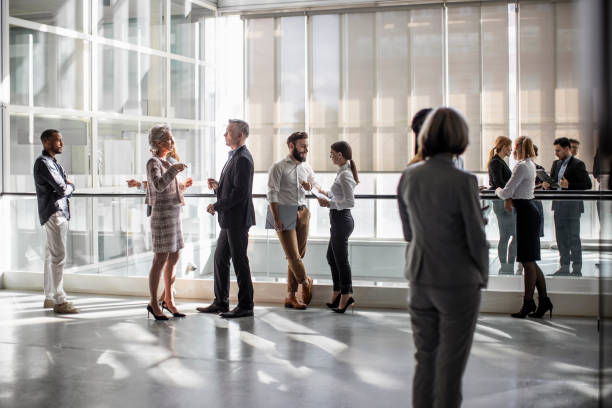 istock Diverse Professionals Engaging at a Dynamic Business Conference 2190510460
