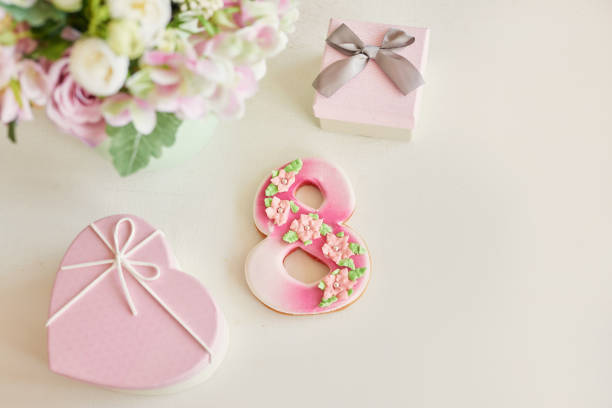 istock Gingerbreads for March 8 in the bright kitchen with flowers 2190511722