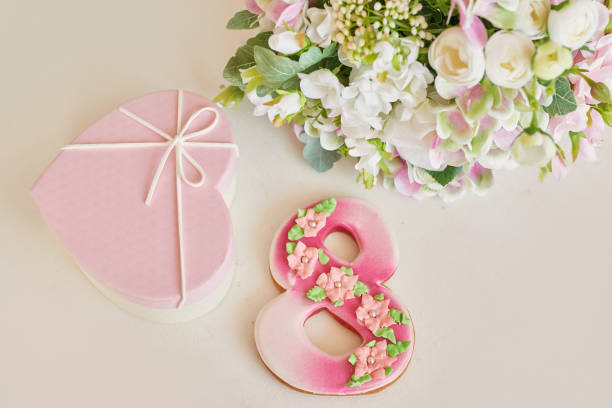 istock Gingerbreads for March 8 in the bright kitchen with flowers 2190511748
