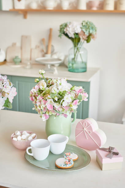istock Gingerbreads for March 8 in the bright kitchen with flowers 2190511855