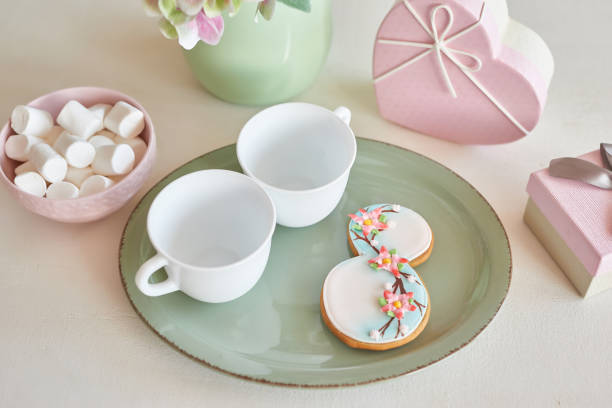istock Gingerbreads for March 8 in the bright kitchen with flowers 2190512387