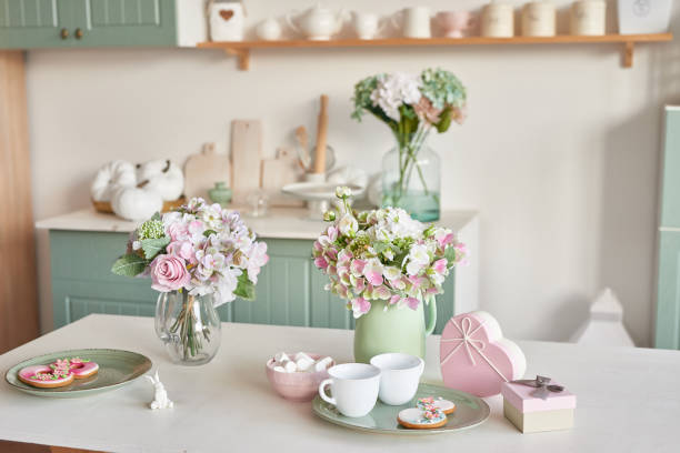istock Gingerbreads for March 8 in the bright kitchen with flowers 2190512403