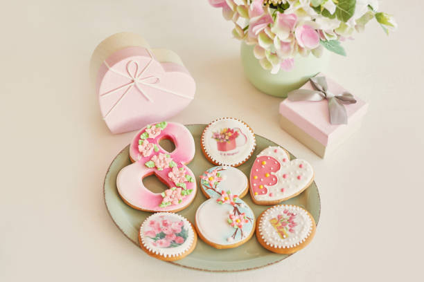 istock Gingerbreads for March 8 in the bright kitchen with flowers 2190512425