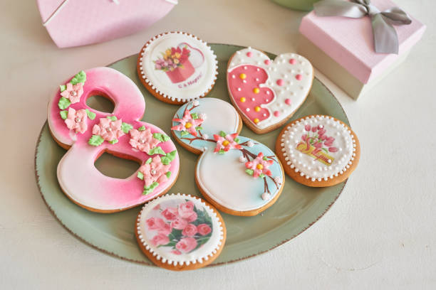 istock Gingerbreads for March 8 in the bright kitchen with flowers 2190512427