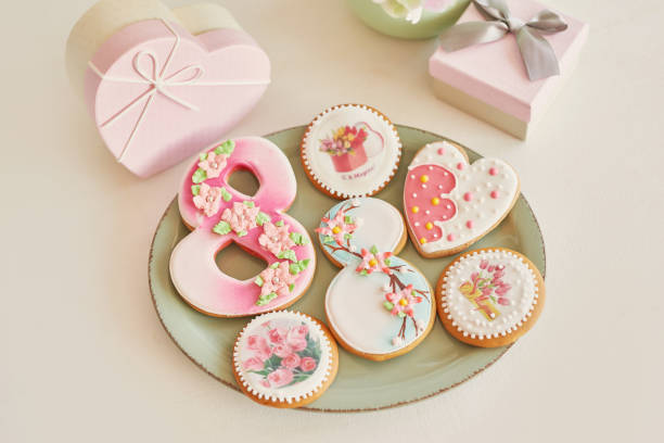 istock Gingerbreads for March 8 in the bright kitchen with flowers 2190512434