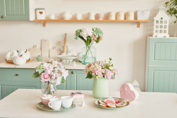 istock Gingerbreads for March 8 in the bright kitchen with flowers 2190512519