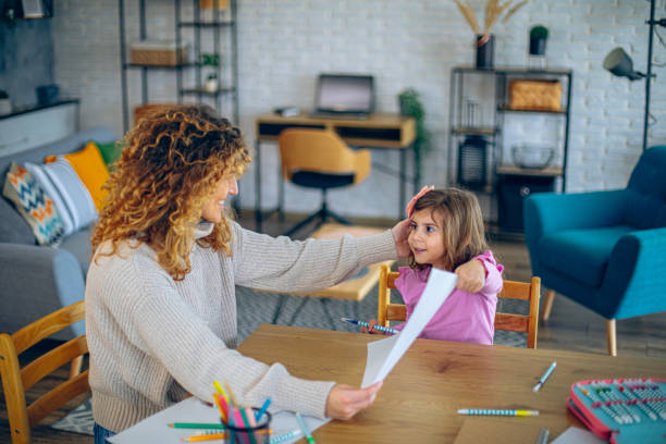 istock Mom and daughter joyfully creating art together 2190514354