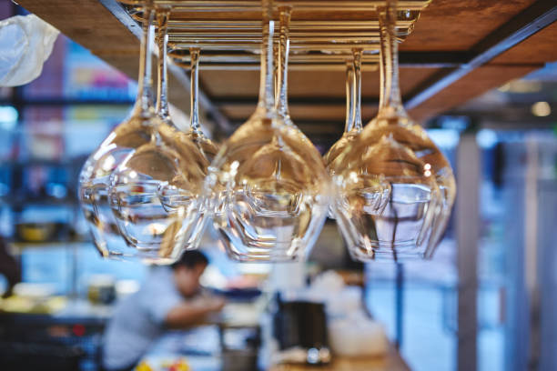 istock Close-Up Of Upside Down Hanging Wineglasses 2190514937