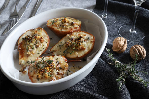 istock baked half pears with gorgonzola cheese. 2190515630