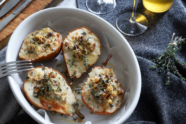 istock baked half pears with gorgonzola cheese. 2190515655