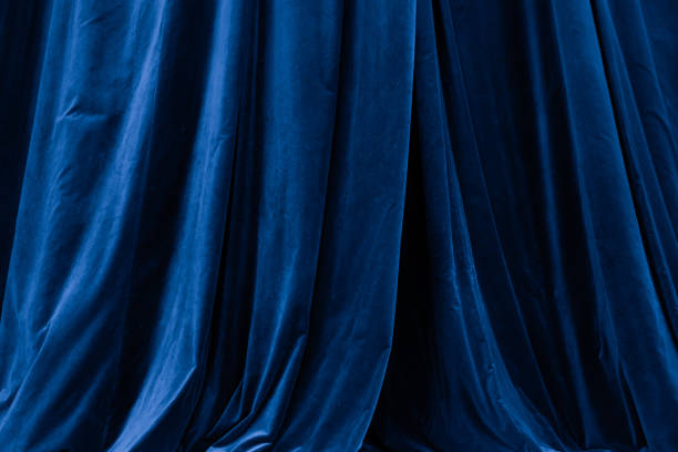 istock Blue curtain in theatre background 2190519204