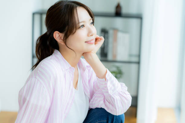 istock woman relaxing in the room 2190519926